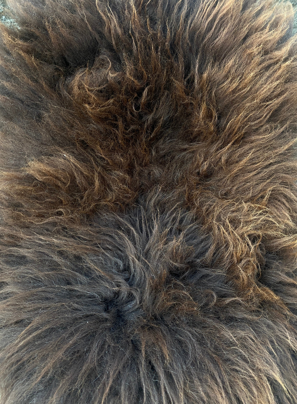 Brown sheepskin rug close up 