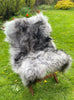 Black tipped Icelandic sheepskin rug on chair