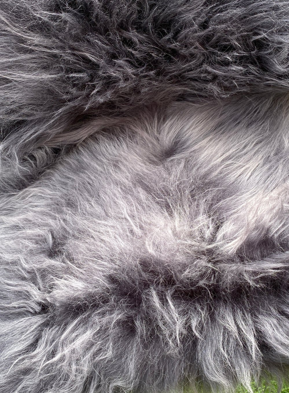 Dark grey Icelandic sheepskin rug close up 