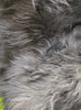 Black Icelandic sheepskin rug close up 