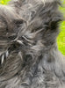 Black Icelandic sheepskin rug close up 