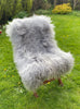 Light grey Icelandic sheepskin rug  on chair