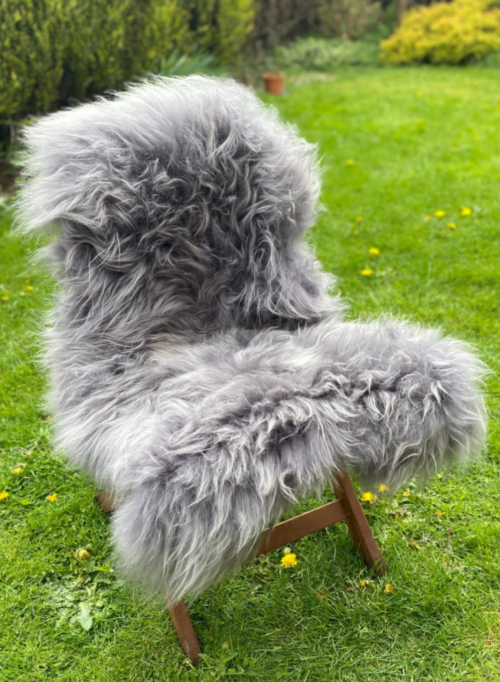 Slate grey Icelandic sheepskin rug on chair