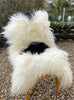 Black and white Icelandic sheepskin rug on chair