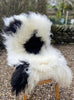 Black and white Icelandic sheepskin rug on chair