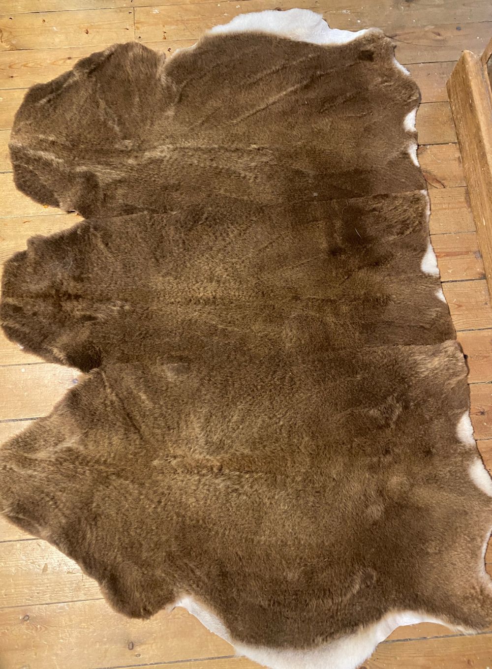 Brown short wooled triple sheepskin rug