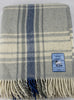 Light grey and blue plaid chunky wool travel rug