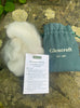 Hiker's Wool with Glencroft packaging on a stone surface