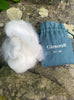 Hiker's Wool and Glencroft packaging on a stone wall