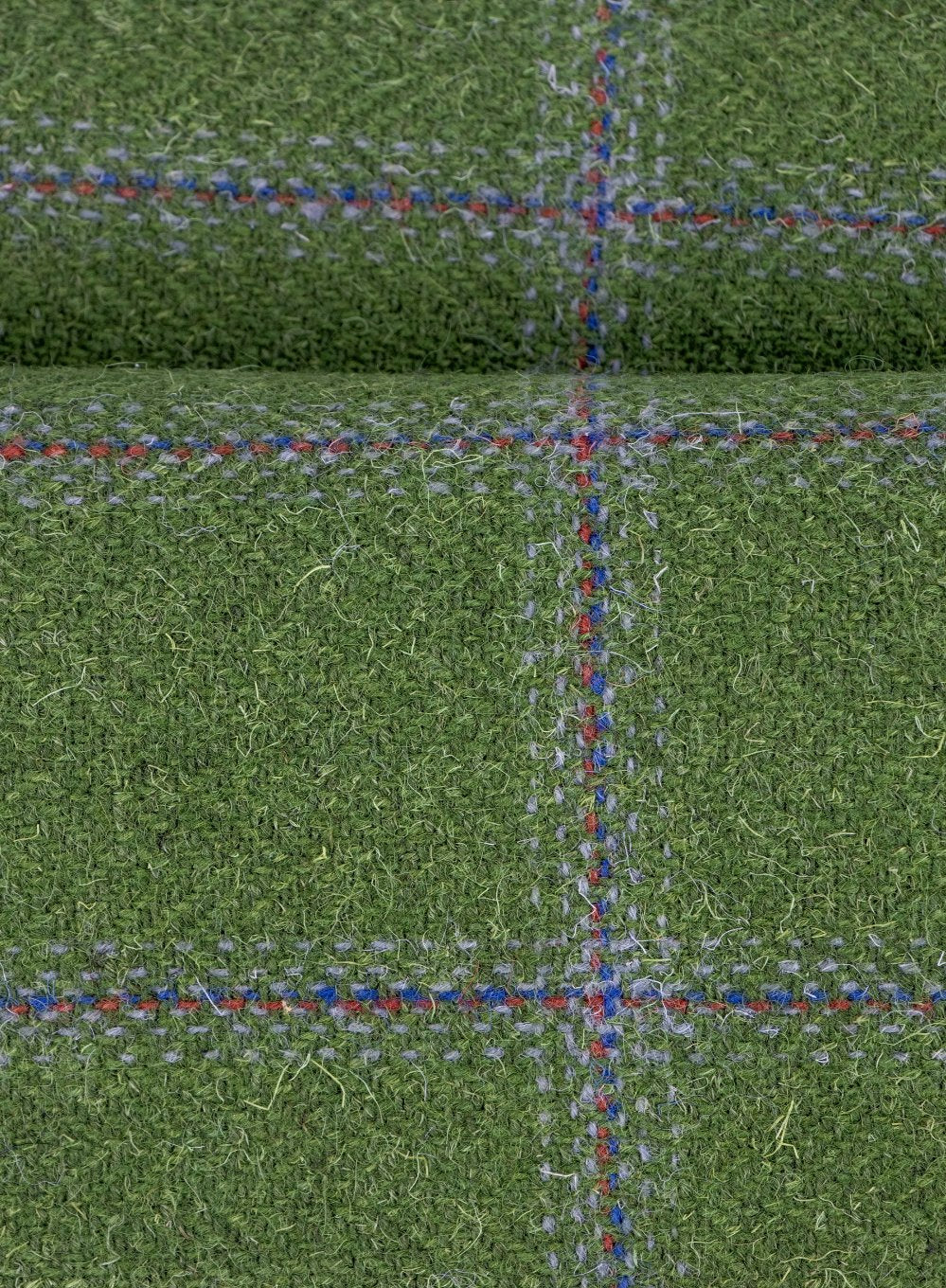 Close up of green checked tweed cloth 